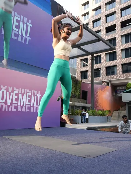 A dynamic jump shot from the Lululemon session. WARRIOR Rhythm incorporates HIIT elements to get the heart rate up, making it a comprehensive and exciting workout.
