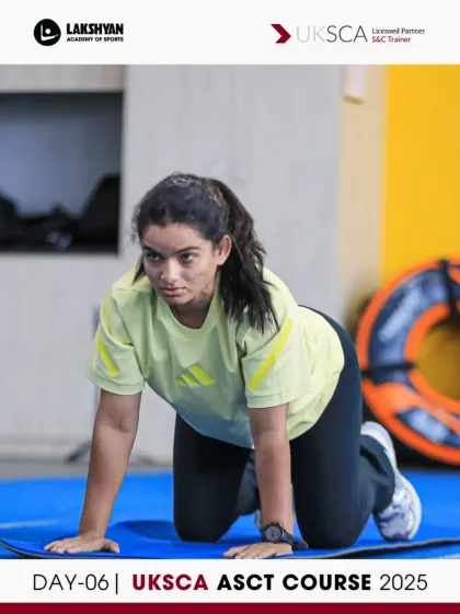 A coach-in-training works on her foundational movement patterns during the Day 6 assessment week.