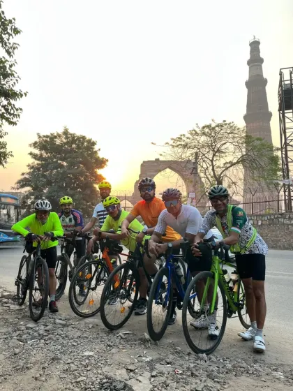 The full group from our Qutub Minar heritage ride. The sunrise, the history, and the strong bonds make these rides unforgettable.