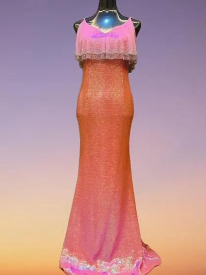 This pink sequin gown features a flattering V-neck and a fringed overlay on the bodice. It's a perfect rental for anyone looking to combine classic glamour with a modern, playful twist.
