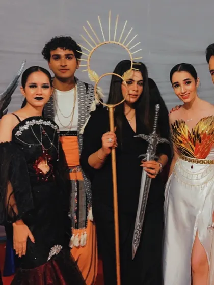 Makeup artist and guest Amandeep Kaur with student models backstage, showcasing the fantasy makeup for the show.