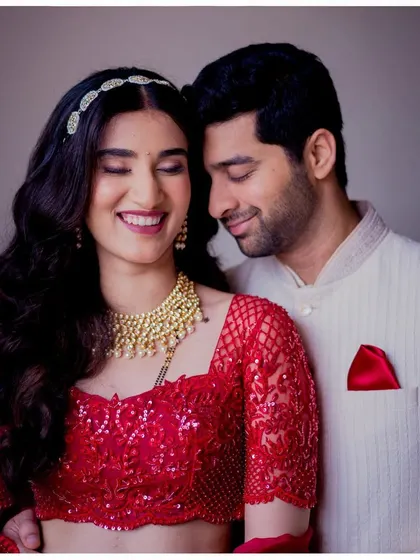 Fresh as a daisy. For Aditi's reception, we went with a matte look to let her gorgeous red lehenga be the focus. Her smile and glowing skin completed this simple, elegant, and timeless look.