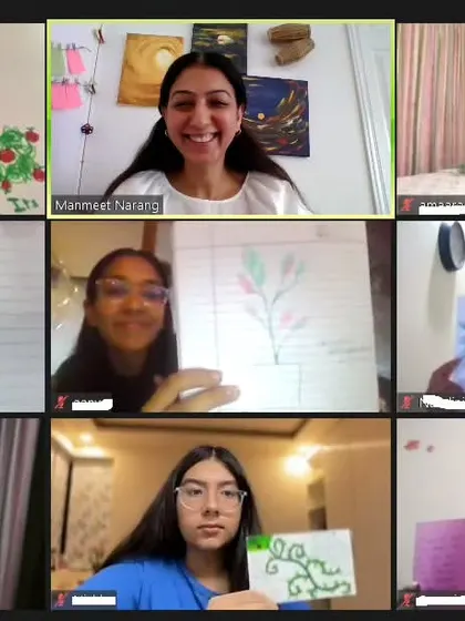 A beautiful moment from the 'Aurora' creative writing series where young participants proudly share the artwork they created. We explored how we are all "different yet the same," using both art and words to connect with ourselves and each other.