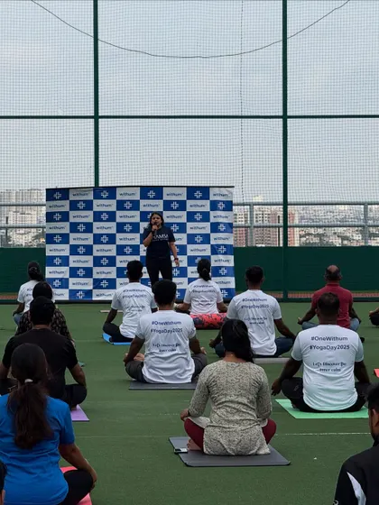Addressing the group at Withum against the backdrop of the Bengaluru skyline. My goal is to create an inclusive environment where every employee feels comfortable and guided.