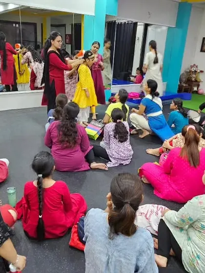Another view of our costume and makeup workshop. Students gather around to learn from an expert, gaining practical skills that are essential for a performer.