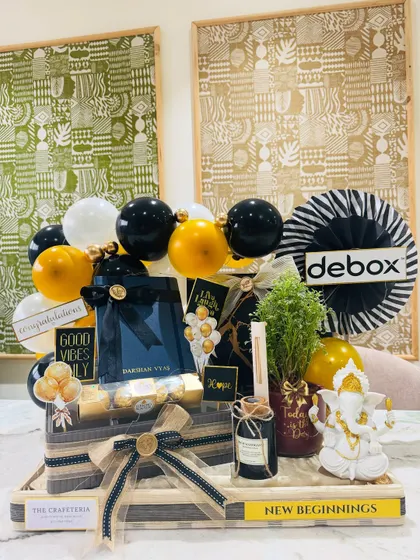 Another angle of the complete corporate gift set, showcasing the balloon arrangement and the balance of all the curated items. It’s a gift designed to make a statement on a professional's desk.