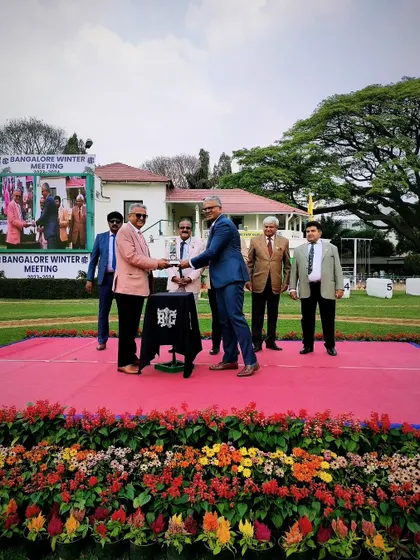 The P.V. Shetty Memorial Cup is presented to the winning connections.