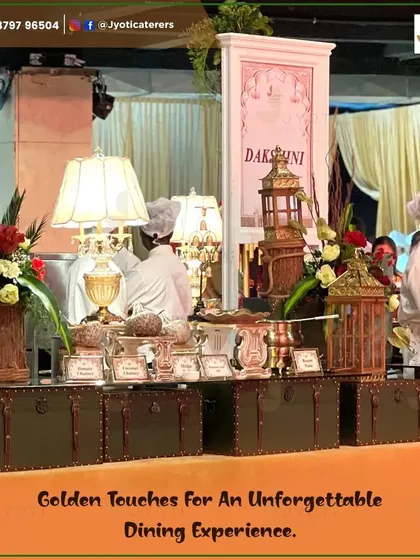 Our chefs at the 'Dakshini' counter, a South Indian food station styled with vintage trunks, ornate lanterns, and classic table lamps for a touch of old-world charm.