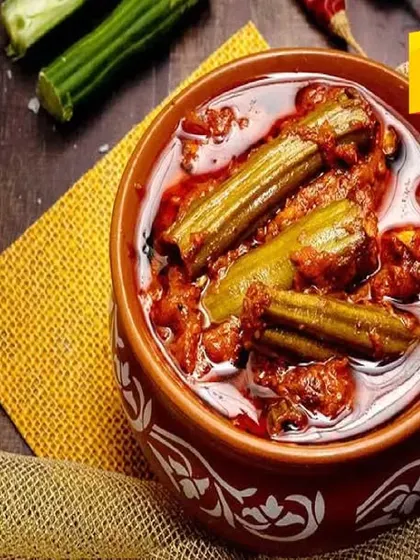My special Drumstick pickle, a unique and delicious pickle that is full of flavor. It's made with tender drumsticks and a blend of traditional spices.