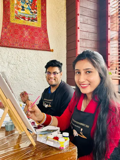 A couple enjoying a creative date at our workshop. Painting together is a fun and relaxing way to spend quality time.