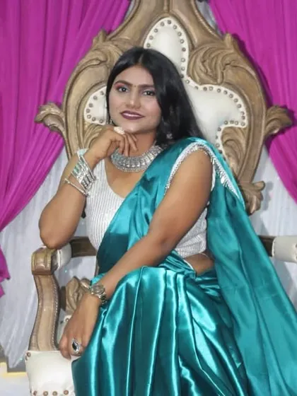 A regal pose. The client looks stunning with her smokey eye makeup and oxidized jewelry.