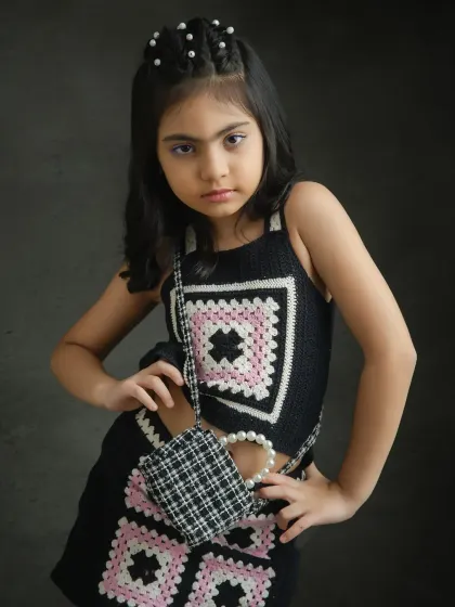 A strong and striking pose. We work on different looks to show her versatility as a child model.