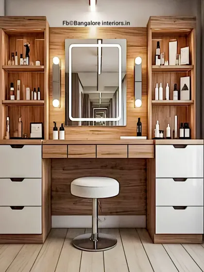 This custom dressing table provides ample storage with multiple drawers and open shelves. The large mirror with vertical light bars ensures perfect lighting for getting ready.