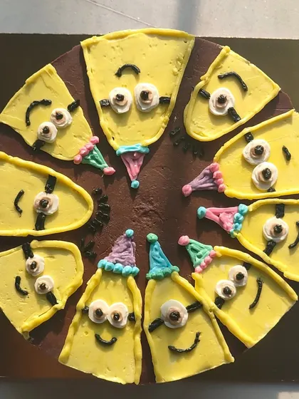 An overhead view of the Minion madness! This design is perfect for kids who love the Despicable Me movies and want a fun, interactive birthday cake.
