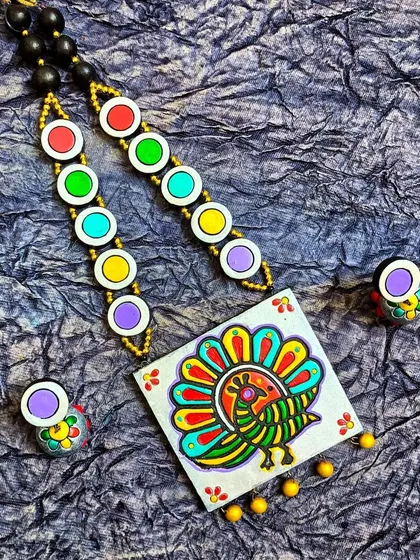 A duplicate image of the square peacock necklace, ensuring potential buyers see this popular design.