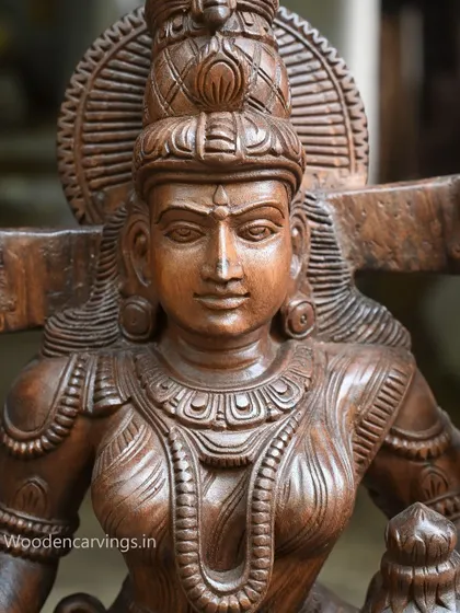 A close-up of the face of the 36-inch MahaLakshmi, showing her calm and prosperous demeanor.