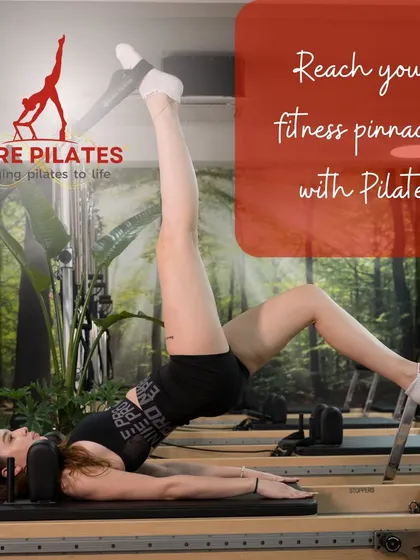 Reach your fitness pinnacle with Pilates. This client performs a single leg bridge on the Reformer, a powerful move for the glutes, hamstrings, and core.