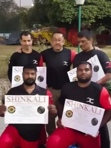 My students proudly displaying their SHINKALI promotion certificates after training with Sensei E. Grading is an important part of the martial arts journey.