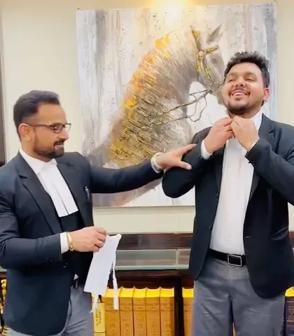 A proud moment, helping a former intern put on his advocate bands for the first time. This transition from student to professional is a journey I am privileged to witness and support.