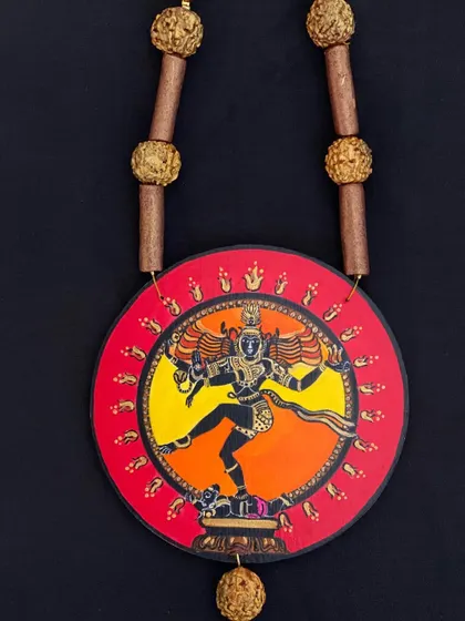 A hand-painted miniature of Nataraja, the dancing Shiva, captured in a moment of cosmic energy. The vibrant sunset colors in the background and the detailed posture make this a powerful piece of spiritual art.
