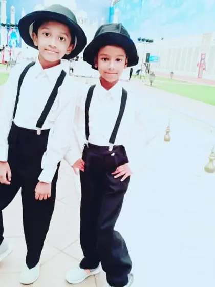 Two of our sharpest young dancers dressed up for a performance.