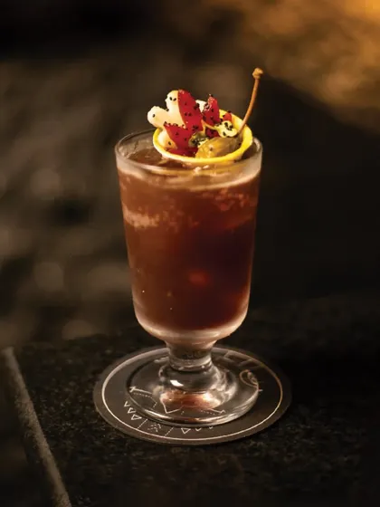 The 'Angel's Share' is an aperitivo-style cocktail with a slight fizz and a tangy balsamic flavor. It's a complex blend of gin, our own balsamic vermouth, Campari, and bitters.