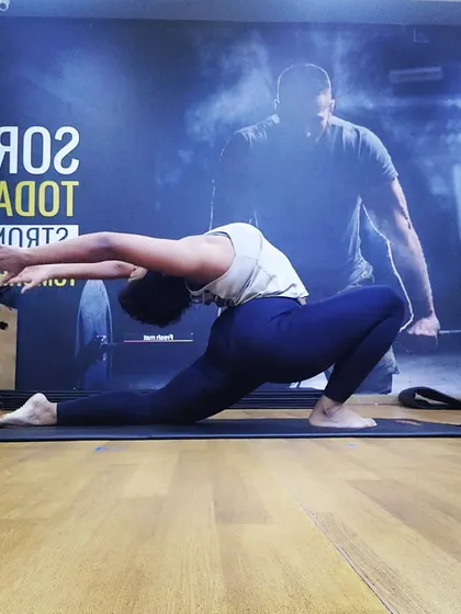 A full expression of the low lunge, reaching back to open the chest and shoulders. This variation adds an upper body component to the deep lower body stretch.