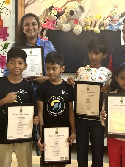 **Work Hard, Shine Bright.** A group of our young achievers from Hyderabad proudly display their hard-earned certificates. Their success is our success.