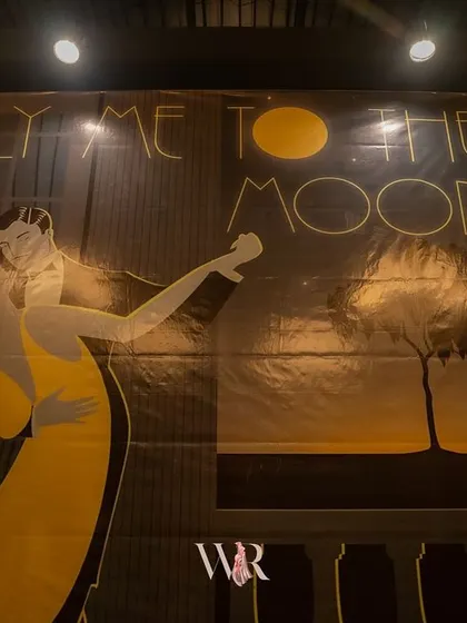 A "Fly Me to the Moon" backdrop for a Jazz Club themed cocktail night. This custom piece set a romantic, old-hollywood mood and served as a fantastic photo opportunity for the couple and their guests.