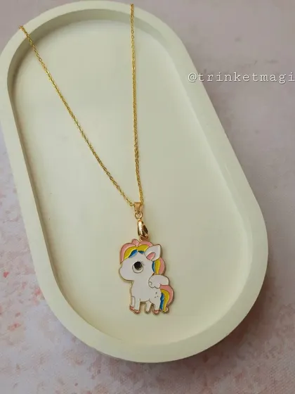 A sweet and simple pony charm necklace, with a rainbow-colored mane and tail. A classic choice for any kid who loves horses.