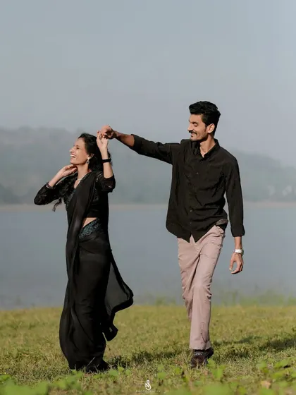 A graceful dance by the lakeside. The movement and connection between the couple make for a dynamic and beautiful photograph.