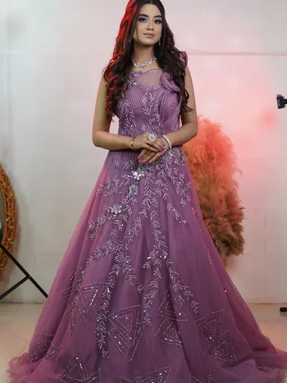 Another angle of the gorgeous onion pink gown, showing the delicate details on the bodice. The color is unique and photographs beautifully under any lighting.