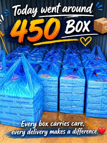 Blue delivery bags filled with stacked snack boxes sit together at dispatch in this bulk order we have packed.
