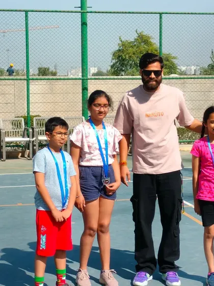 Posing with the medal winners from our inter-society basketball matches. Recognizing achievement is part of our culture.