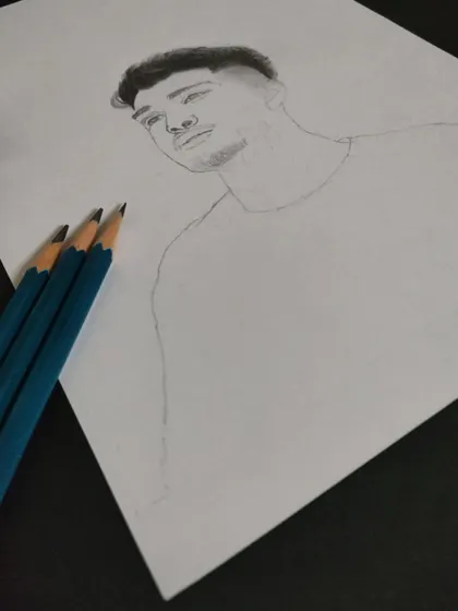 The first step is always a clean outline. This is a work-in-progress shot of a portrait before the detailed shading begins.