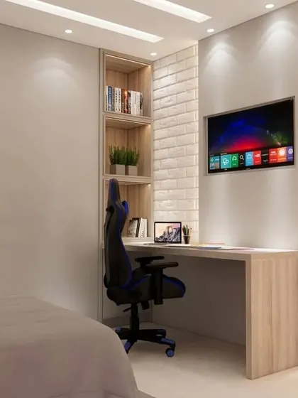 A close-up of the study nook, showing the built-in bookshelves and wall-mounted TV.