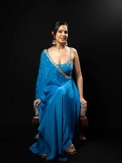 Another seated pose, showing how the outfit looks from a different angle.