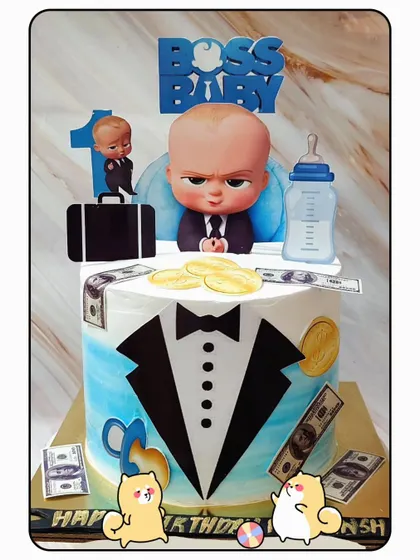 For your own little boss baby who runs the house! This cake is perfect for a first birthday, complete with a tuxedo design, edible money, and the boss himself on top.