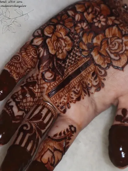 A single hand view of the floral bouquet, showing the detail and shading that brings the design to life.