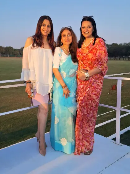 Enjoying the polo finals with fellow guests. These events are as much about the sport as they are about the social connections, and I help facilitate a warm and friendly atmosphere.