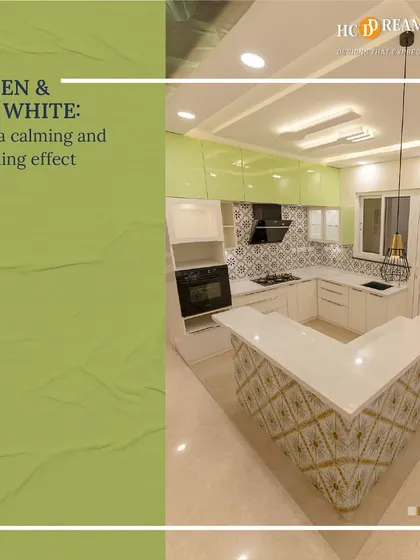 A calming kitchen design featuring a soft green and off-white color palette. The island with a breakfast bar adds extra workspace and a casual dining spot, making the kitchen a social hub.