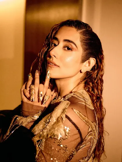 Styling Jonita Gandhi for her opening performance at the Dua Lipa concert in Mumbai was an incredible experience. We selected this exquisite Rahul Mishra Couture piece, focusing on intricate embroidery and pairing it with statement boots for a powerful stage presence.