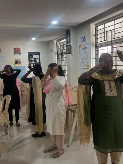 More teachers engaging in a calming 'brain break' activity. These simple exercises are powerful tools for self-regulation that educators can use for themselves and their students.