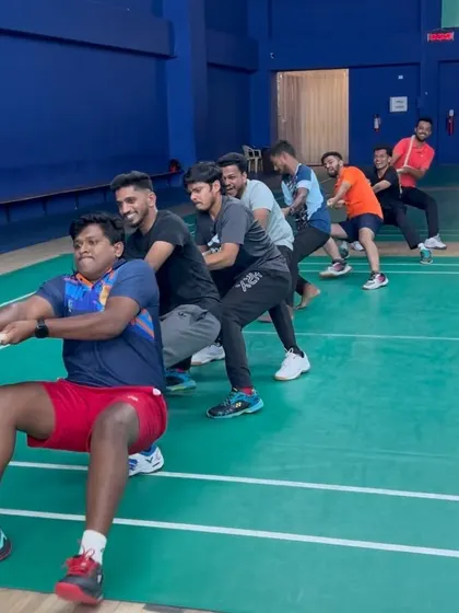 It's not all drills and theory. I incorporate team-building activities like this tug-of-war to foster camaraderie and a supportive learning environment among the coaches in my program.
