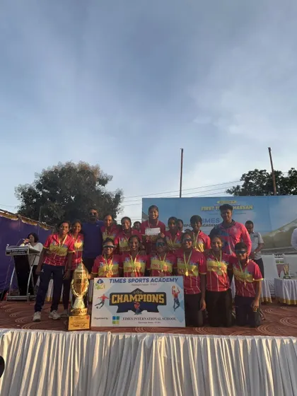All smiles on the presentation stage after winning the Times Cup. We believe in celebrating every success as a team.