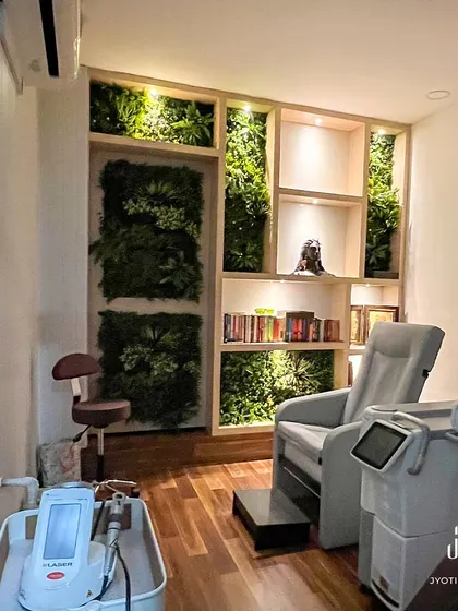 This is the treatment room at the dental clinic. I incorporated a vertical garden wall and custom shelving to bring a sense of nature and tranquility indoors, helping to ease patient anxiety.