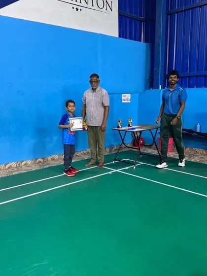 Another one of our young trainees is recognized for his performance during our camp's concluding tournament, receiving his certificate and award.
