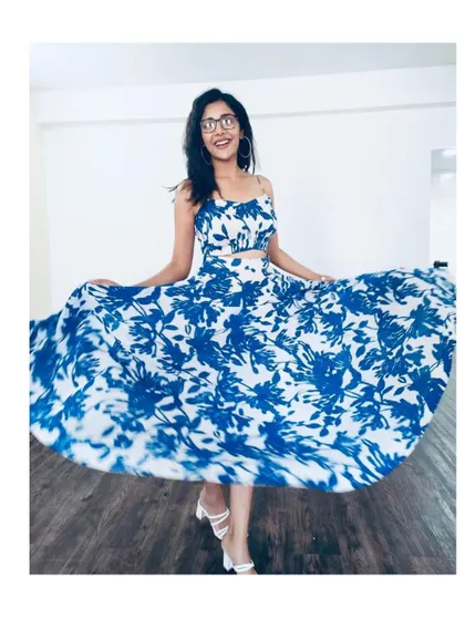 The twirl-worthy skirt of this summer co-ord set is perfect for capturing fun, happy moments.