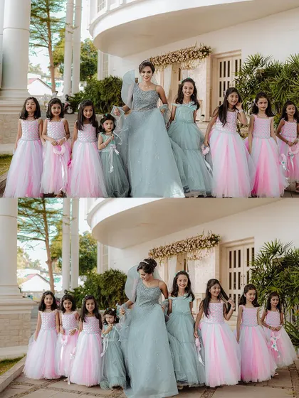 A lovely group photo of the bride with all her flower girls in front of the wedding venue.