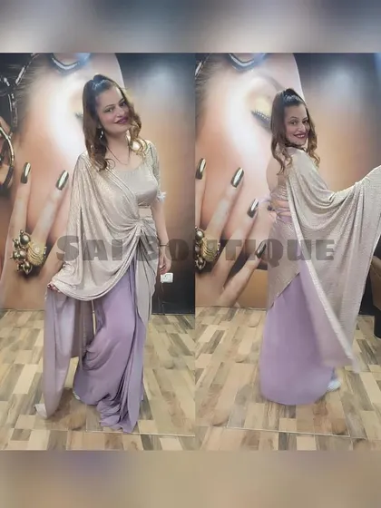 A beautiful two-tone draped dress in lavender and beige. This outfit is made from a flowy, comfortable fabric, making it perfect for dancing the night away.